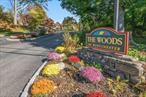 Welcome to The Woods Condominium, a highly desirable community in Westchester known for its privacy, convenience, and easy lifestyle. This beautifully maintained three-level townhome has been extensively upgraded and thoughtfully designed for todayâ€™s modern living.Step inside to discover a bright, open interior that blends comfort and efficiency. Recent updates include a high-efficiency boiler with an instant hot water tank, an air conditioning unit with air handler system, and energy-saving windows and sliding glass doors throughout. Every detail has been carefully chosen to create a home that is both stylish and functional.The renovated kitchen is a true centerpiece, featuring modern appliances, generous cabinetry, and a spacious breakfast bar with seating for five. It is perfect for entertaining friends, enjoying casual meals, or simply relaxing at home. All bathrooms have been redesigned with high-end finishes to offer a spa-like retreat at the end of the day. The lower level has a family room perfect for relaxing and watching TV or an energetic work out. an extra space is set-up as a bedroom, can be an office with slider to the patio.Additional improvements include a new garage door and a recently replaced roof completed by the association. The current owner has already paid the full roof assessment of over $12, 000, providing added peace of mind and long-term value.Enjoy a low-maintenance lifestyle with resort-style amenities and a convenient location close to shops, restaurants, parks, and major highways. Whether you are seeking a primary residence or an investment property, this move-in ready townhome at The Woods offers the perfect blend of luxury, comfort, and community living.