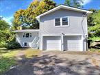 Split Family Home. Many Upgrades. Living Room, with new floors, New Kitchen with sliding glass doors to deck. Dining Room over looking deck with private back yard. two new baths, 2 car garage. Family room has a walk out to side yard .This is a Fannie Mae Home Path Property.