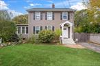Nestled in a picturesque neighborhood of Huntington Estates, this classic 1920&rsquo;s Colonial exudes timeless elegance and charm. This home sits on .33 acre, minutes from downtown Huntington village. Inside, youâ€™ll find the formal living room with wood burning fireplace, a charming window-lined sunroom, bathed in natural light with a full closet and brand new bathroom. This room is perfect for an office, den or guest room. Steps away is the updated kitchen, featuring wood cabinetry with ample storage. The rich tones of the cabinetry beautifully complement the stone countertops, which offer a durable and stylish workspace for culinary endeavors. Thoughtfully designed for convenience, the kitchen is strategically located adjacent to the dining room, allowing for effortless transitions between meal preparation and dining.&#160; Oak floors throughout the first floor offer a sense of continuity that ties the entire level together.&#160;The second floor boasts three generously sized bedrooms, with large windows, allowing natural light to fill the rooms, creating a bright and welcoming atmosphere. A full updated bathroom completes the second floor. The pull-down attic stairs provide easy access to a full unfinished attic, offering endless possibilities for future expansion or storage.The full unfinished basement offers additional potential for the future. Step outside and discover a large, private backyard that is perfect for both relaxation and recreation, offering ample room to enjoy the great outdoors in peace and seclusion. The spacious rear deck is ideal for entertaining guests, hosting family barbecues, or simply unwinding with a good book. Beyond the deck, the lush green lawn stretches out, bordered by mature trees and shrubs that enhance the sense of privacy and natural beauty. A detached two-car garage completes the backyard.
