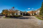 If you&rsquo;re seeking an extraordinary lifestyle, look no further. Luxury & convenience is combined in this 24hr gated Condo Community. This main floor unit provides a seamless entryway right from the outside with no steps to climb for those seeking comfort and accessibility. Newly painted & immaculate the entry foyer leads into a large living room/dining room with wood flooring & siders to an outdoor patio. Updated eat-in-kitchen with granite countertops, plenty of cabinets and glass doors to a covered patio with bbq for dining pleasure. Primary bedroom with walk-in shower and ample closets. An additional bedroom, full bath, laundry and one car attached garage. CAC, washer dryer, new hot water heater. Bring your style to make this blank canvas a space that reflects your own taste & lifestyle. The Hamlet offers numerous amenities. Magnificent Clubhouse with full time concierge service is the place to gather. A fitness center, card rooms, a salon & spa. Indoor & outdoor pools, lighted tennis & pickleball courts, basketball courts & a playground. Fabulous restaurant overlooking the lake to relax and dine in or takeout. This condo offers a serene escape while being minutes away from it all. Embrace a lifestyle of comfort, elegance and convenience in this prestigious community. Plainview SD.
