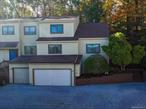 **Welcome to this beautifully maintained end-unit townhome in the highly desirable Timber Ridge community-where comfort, style and convenience converge. Featuring 3 bedrooms and 3 full baths, this home offers a thoughtfully designed layout that blends modern upgrades with natural charm. The gourmet kitchen is a standout, showcasing rich Cherrywood cabinetry, granite countertops, ss appliances and counter seating for four. A dedicated dining area makes entertainment effortless while two oversized pantry cabinets with pull-out shelving provide smart storage solutions. The living room is filled with natural light thanks to vaulted ceilings and skylights complemented by gleaming hardwood floors and a cozy fireplace. A sliding glass door leads to a private patio with a wooded backdrop, perfect for relaxing or hosting guests. The first floor offers an updated guest bathroom, spacious bedroom plus a primary bedroom suite that includes a full bath and walk-in closet offering single level living. Upstairs, you&rsquo;ll find a 3rd generous bedroom, a third full bath & a bonus open den ideal for a home office or creative space. Additional features include a full basement with laundry area, ample storage and direct access to the two car garage. The home is equipped with all municipal services and natural gas fuel for added convenience. Its a great commuter location near bus stops, major highways and minutes to trains. Residents also enjoy exclusive access to* Woodbury&rsquo;s private recreational amenities, including The Rez lake, pool and *Monroe Woodbury Schools. This home is a must see for buyers seeking space, style and a vibrant community lifestyle.