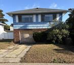 Great Opportunity At This Price: Hi-Ranch With Mother/Daughter Potential Is Offered At $499, 000 Which Is Currently The Lowest Asking Price In Island Park. There Are 3 Bedrooms & A Full Bath On The Main Level With A Den And Access To An Enclosed Back Yard A 2nd Full Bathroom & A Laundry Room On The Lower Level. There Is Also A Storage Attic. The Roof Is Only 10 Years Old.Situated Off Austin Blvd The Property Is Close To Public Transportation, Shopping, Schools Etc. Also It&rsquo;s Within Easy Reach Of Long Beach With All It Has To Offer.The House Is Being Sold AS IS & Requires Cash Or A Mortgage That Allows For Renovations.Total Taxes (which Are Being Grieved) Are Only $9, 847.17 After The Current Basic STAR reduction of $794.00.