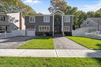 Welcome to this spectacular, fully renovated 5 bedrooms, 5 bathrooms Colonial Style in the desirable Massapequa Park Village.This exquisite home offers a perfect blend of modern luxury and classic charm.As you step inside, you&rsquo;ll be captivated by the open concept layout, which seamlessly connects the living areas.The stunning kitchen features a premium 5-burner stove, a wall oven - microwave combo and pristine quartzite countertops. The oversized waterfall island not only provides ample prep space but also houses a wine fridge and extra storage, making it perfect for entertaining family and friends.The luxurious first floor is adorned with radiant heated floors, ensuring year around comfort. Each of the 5 beautiful bathrooms is equipped with smart toilets and heated floors.With elegant wainscoting and custom millwork throughout, this house exudes sophistication. Enjoy modern frameless glass railings that enhance its contemporary feel. The exterior features one car garage, paving stones, a eight-foot-tall wrought iron double doors. 2-zone air conditioning system. Finished basement (entertaining room) with egress window, full bath and laundry room. Beautiful Backyard with a new sprinkler system and all fenced in. Schedule your private tours 24/7