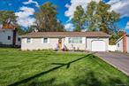 Sprawling updated ranch Larger than appears with a full basement & a 1 car attached garage with interior access. Den is a step down with cathedral ceilings, ceiling fan access to rear patio & fireplace.Updated roof siding & some windows. Tiled floors in hallway & kitchen. House has good curb appeal! Primary bedroom has 1/2 bath. Roof replaced in 2012 Washer & dryer 1 year old IGS in front Many new windows Cac 200 Amp updated electric Above ground oil tankThis home won&rsquo;t last!