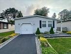 **House Includes a 1-Year Home Warranty that covers Heating systems, appliances, etc....**** Owner Financing available****Welcome to 16 Village Circle, Manorville â€“ Aspen Model Condo in Greenwood Village (55+ Community)**Beautifully maintained 2 Bedroom, 2 Bath Aspen Model in the desirable gated community of Greenwood Village. This spacious unit offers an open-concept living/dining/kitchen area with vaulted ceilings, creating a bright and airy atmosphere. Primary bedroom features a full en-suite bath, separate dual vanity, and walk-in closet.Recent updates include: newer carpet, fresh paint, updated appliances, 6-year-old roof, updated hot water tank, new wall AC unit, custom blinds, Green Seal insulation throughout, washer/dryer under 3 years old and 200 amp electric service. Additional features include a 1.5-car attached garage, crawl space for storage, and a large deck with awning.HOA includes: water, sewer, exterior maintenance, lawn care, clubhouse, gym, in-ground pool, tennis, shuffleboard, and more. **Cash only purchase** due to land lease restrictions.Donâ€™t miss this opportunity to live in a well-maintained, amenity-rich 55+ community.