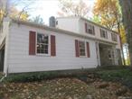 4 Bedroom 2.5 bath Colonial on private lot in Wappinger! The main level boasts hardwood flooring throughout, spacious living room, dining room, & family room with fireplace. Like to cook? Massive kitchen with plenty of counter & cabinet space. Upper Living level has hardwood throughout, 3 generous sized bedrooms, an office, Full bath, Primary bedroom & updated primary bath. Relax, entertain & play in your level rear yard. Plenty of parking in your oversized 2 car garage. New roof! Close to Route 9, Metro North Trains, I-84, & Taconic parkway.