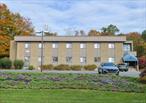 Execeptional opportunity to purchase this 3 story office building located directly on Rt 211 across from the new Adams Fairacre Farms and less than 1 mile to Exit 120 on Rt 17/Future I-86. Nestled on a 1.5 acre lot with 232 ft of clear frontage on busy Rt. 211 with a daily traffic count of 17, 490 vehicles and growing providing great exposure. Paved parking lot to accomodate approx 60 vehicles. The building is fully handicap accessible with elevator access to all 3 floors and has a wet sprkinler system. New roof was installed in 2020. Municipal water/sewer and Natural Gas HVAC heating systems with Central A/C for maximum comfort as well. Current use is professional office with some medical office space. Explore the possibility to purchase as an owner/user or the potential to negotiate leases with current tenants to remain and add a great investment property to your portfolio. Contact listing agent directly for more details or to schedule a showing.