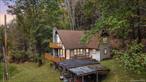 Hunters, outdoorsmen, and nature lovers, this is your Catskills escape! Tucked deep in the woods on 15+ private acres and completely surrounded by state land, this 2 bedroom, 2 full bath hunting cabin offers unmatched seclusion, wildlife, and adventure right out your back door... Step inside and youâ€™ll find a warm, rustic interior with vaulted wood-beam ceilings, large picture windows, and a cozy wood-burning stove; the perfect place to unwind after a long day in the woods. The open layout features 9 total rooms, including a loft with balcony ideal for extra sleeping space, gear storage, or a quiet home office overlooking the forest. This property was built with hunters in mind, offering easy access to 15+ acres of game lands, established deer trails, and prime hunting terrain for deer, turkey, and small game. With a spring-fed well, a reliable 15-year septic system, and a newer 5-year-old wood burning stove, itâ€™s a true blend of comfort and wilderness living! Whether youâ€™re looking for a base camp for hunting season, a year round off-grid hideaway, or simply a place to enjoy peace, privacy, and the outdoors, this Grahamsville cabin delivers the full Catskills experience. Contact Connor Blake today at (973) 903-6854 to schedule your private showing and experience this sportsmanâ€™s paradise for yourself!