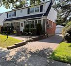 Mid block location, in the highly desirable area of Mineola. OVERSIZED bedrooms (16.5 x 11.5; 24x11 etc.), Also a large FDR, with a large EIK. (gas cooking and more than ample cabinets and counter space). Sun splashed, fully glass enclosed, 310 S.F. rear porch. This center hall, features hardwood floors, plaster walls and a full bath on both floors. The electric and windows have been upgraded. A very private backyard with IGS. Stone and brick exterior. The 1.5 car garage leads to a long pavers clad driveway. The finished basement adds additional usable space. And did I mention the LOW, LOW taxes.