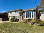 Welcome to this Beautiful expanded Split-Level Home featuring 4- Bedrooms, 2.5- Bathrooms with over 1, 900 square feet of living space in the heart of Massapequa Park. Upon entry, guests are greeted with a warm and inviting space, filled with bright natural light pouring through the elegant bay windows. Also featured on the main floor is a clean, modern kitchen with sleek black granite countertops that flows into the formal dining room. The lower level of the home showcases a cozy den centered around a charming wood-burning fireplace. From here, wooden doors open to a lovely patio area set within a spacious, fenced-in-yard perfect for relaxation or entertaining. Located near parks, shopping and transportation. Come and discover the beauty and potential of this homeâ€”an opportunity you wonâ€™t want to miss.