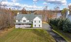 Lakefront Colonial Home set back from road with front porch leading to a welcoming foyer with closet. There is a living room and formal dining room on the first floor. Open setting Kitchen with granite countertops and large den with full view of the lake with French doors open to deck. There is a half bath and large pantry. Upstairs has 5 bedrooms including a luxury primary suite, with Juliette balcony with windows with full view of the lake and 2 walk in closets, 2 Full baths. Large unfinished attic and Full unfinished basement the size of the house with sliding doors to brick patio with firepit and grill with full view of lake and a 3 car garage.