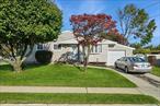 Nicely maintained expanded ranch on a 75 x 100 lot with an open floor plan. Kitchen has been extended with a sizeable dining area.  Sweeping living room that leads to a sunken den and garage entrance. Three bedrooms with Primary bedroom having a private half bath that could easily accommodate a stall shower. Full basement is partially finished. Central air conditioning. Backyard is fenced with vinyl and chain link. Perfect opportunity to make this your own.