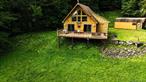 Secluded Catskill Mountain Retreat on 105 Acres.Escape to your own private paradise in the Catskills! This turn-key 1, 100 sq. ft. chalet, built in 2005, sits on 105.8 acres of pristine woodland with breathtaking long-range mountain and Pepacton Reservoir views.The open-concept floor plan features vaulted ceilings, tongue-and-groove pine, and a wood-burning stove for cozy mountain living. Two sliding glass doors lead to a spacious 22&rsquo; x 32&rsquo; deck, perfect for soaking in the panoramic scenery.Inside, youâ€™ll find a comfortable bedroom (13x12), an 11x17 loft, and a large bathroom with a shower and stackable washer/dryer. The fully equipped kitchen includes a gas stove, refrigerator, built-in microwave, and plenty of storage. Electric baseboard heat supplements the wood stove for year-round comfort. The live-edge hemlock siding adds a classic rustic touch to the homeâ€™s exterior.Outdoors, enjoy a deep freshwater pond, miles of private trails, and abundant wildlifeâ€”including deer, bear, and fox. The property borders thousands of acres of State Forest, offering unmatched privacy and endless opportunities for hiking, hunting, and exploration.Located just 20 minutes from Roscoe or Downsville, NY, and about 2.5 hours from NYC, this peaceful retreat offers the perfect balance of seclusion and convenience.Donâ€™t miss this rare opportunity to own a Catskill mountain getaway where luxury and nature meet.