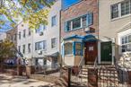 Best Location in the Heart of Greenpoint, Brooklyn. Attached Brick Legal 1 Family House on a Great Block. Main Level features LR w/fplc, EIK, FDR or 1 Bdrm w/fplc, Office and New Floors on Main Level. Second Floor presents 2 Bedrooms, 1 Full Renovated Bath. Full Bsmt W/Utilities & Laundry. Private Yard. Very Convenient to Transportation and Shopping!