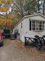 This 14 x 68 Manufactured Home is located in a well maintained community. It has been remodeled with new windows & beautiful laminate flooring. The kitchen offers counter seating and plenty of storage. It sits a nice size lot with woods in the back. Close to Woodstock, Kingston and route 87.