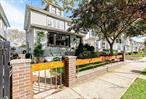 Forest Hills Colonial with a Rare Sunlit Extension Wrapped in WindowsThis beautifully maintained detached Colonial sits gracefully on a 30x100 lot, blending timeless Forest Hills charm with warmth and natural light. Built in 1930 and spanning about 1, 861 square feet, the home faces south with eastern exposure, so sunlight pours through every window from morning to afternoon. A rare legal extension creates a bright, sunroom like retreat that feels welcoming year-round - the perfect spot to relax, read, or entertain. Step inside to a welcoming entry foyer that leads to a generous living room centered around a mid-century fireplace. The formal dining room features decorative ceiling beams that add subtle architectural flair, while the open eat-in kitchen offers plenty of storage and flows seamlessly into the sunny extension where daily living feels effortless and connected.Upstairs, youâ€™ll find three comfortable bedrooms and a full bath. The primary bedroom opens onto a large private patio, a retreat for morning coffee or quiet evening moments. A finished attic offers flexible space for a home office, creative studio, or walk in closet, while the finished basement includes a family room, full bath, and laundry area, adding even more versatility. Outside, the backyard is perfect for gardening, grilling, or simply enjoying a slow Sunday. A private driveway and two-car garage complete the picture.Set in one of Forest Hillsâ€™ most desirable neighborhoods, this home offers a peaceful, tree-lined lifestyle with city convenience just moments away. The subway, LIRR, and express buses are nearby, and Metropolitan Avenueâ€™s cafes, markets, and restaurants are just down the street. Forest Parkâ€™s nature trails, tennis courts, and dog park are close enough to feel like an extension of your backyard. Zoned for the highly regarded PS 144 and within a short stroll to Austin Streetâ€™s vibrant shops and dining - this home is truly where timeless charm meets everyday ease.