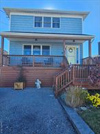 Charming Two Story Home in Waterfront Community. Home was Raised and Rebuilt in 2012. Features 4 Bedrooms and a Full Bath Upstairs.Main Floor Has a Huge Living Room, Dining Room and Eat in Kitchen. Perfect for Entertaining. Kitchen has Sliding Doors to a Deck overlooking the Back Yard That is Fully Fenced in. Storage under the House is Accessible from the back of the House.                Solar Panels are Owned and your Monthly Electric Bill will be $18 Dollars per Month. Buyer of this Home is Eligible to Join the Frederick Shores Beach Club. A Private Club at the Foot of Little East Neck Rd.