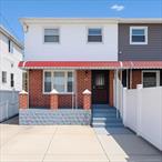 Beautiful Semi Attached Colonial In Jamaica, features a bright living room, dinning area, kitchen and laundry on the first floor. Second floor has 3 bedrooms and 1.5 baths. Full finished basement with outside entrance, private driveway and backyard. Close to school, shopping and public transportation.