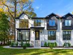 Experience the pinnacle of modern luxury in this newly constructed 9-bedroom, 6.5-bathroom masterpiece, offering nearly 5, 000 square feet of extraordinary living space in the heart of Spring Valley. Built in 2025, this home blends cutting edge design with timeless sophistication, delivering the perfect balance of comfort, elegance, and functionality. Step inside to a grand foyer adorned with large porcelain tile flooring and a striking hardwood staircase, setting the stage for the refined craftsmanship found throughout the home. Large windows fill each room with natural light, highlighting the open concept layout that seamlessly connects the living, dining, and entertaining spaces. The spacious dining room serves as a stunning centerpiece for gatherings, featuring designer light fixtures and ample room to host large family dinners and celebrations in style. Just beyond, the chefâ€™s kitchen impresses with oversized custom cabinetry, a custom hood, and a large island counter, perfect for cooking, entertaining, and everyday living. The primary suite is a true private retreat, featuring extra high tray ceilings, large windows, and a spa-inspired ensuite bath offering the ultimate in relaxation. Each of the additional bedrooms is generously sized and thoughtfully designed to accommodate guests, or home office needs with elegance and comfort. The lower floor expands the homeâ€™s versatility, featuring a secondary primary suite ideal for guests, two additional bedrooms, and a seasonal kitchen. Perfect for multigenerational living or grand-scale entertaining, this level adds both functionality and luxury to the homeâ€™s impressive design. Adding to its appeal, this property is located within the Village of New Hempstead, where property taxes are significantly lower than in the neighboring Village of Spring Valley, a major advantage for homeowners seeking exceptional value alongside luxury. Every detail of this residence reflects uncompromising quality and modern sophistication, from its high end finishes to its brilliant architectural flow. This is more than just a home, itâ€™s a statement of luxury living.