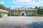 Set atop one of the highest points on Long Island along the Nassau County border, this private all brick estate offers a rare combination of serenity, grandeur, and craftsmanship. Custom built in 2004 with every amenity and detail in mind, this residence showcases timeless design and exceptional quality throughout its 8, 100 square feet of living space. Enter through striking iron double doors to a gracious entry foyer and sweeping bridal staircase. The home features 6 bedrooms and 4.5 bathrooms, . The stunning chefâ€™s kitchen boasts custom white wood cabinetry, Quartzite countertops, a spacious center island, breakfast area, and a convenient butlerâ€™s pantry. Enjoy multiple large principal rooms including an elegant formal dining room, formal living room with coffered ceilings and built-ins, warm family room, unbelievable moldings and millwork throughout and a rich mahogany libraryâ€”all enhanced by five fireplaces that bring warmth and character to every space. Beautiful wide plank, white oak wood radiant flooring throughout main floor, magnificent primary suite offers a true retreat with beautiful walk-in closets, a luxurious marble bathroom and an adjoining exercise room. Additional bedrooms are generously sized, and the second-floor laundry room provides convenience. The recently renovated lower level features radiant-heat floors, high ceilings, and an abundance of recreational and living spaceâ€”perfect for extended family or entertaining. Outdoors, enjoy the heated Gunite pool and spa, pool house with bar, and classic bluestone patio overlooking breathtaking views of the 2.3 acre property. Take in the scenery from the balcony or, for the adventurous, ascend to the unique widowâ€™s walk perched high above the estate. Additional amenities include a three-car garage, whole-house generator, Crestron system, gated entry, a 60-foot winding driveway and belongs to the desirable Half Hollow Hills School District. This exceptional home is truly one of a kindâ€”timeless, sophisticated, and built for the most discerning buyer.