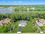 Once in a lifetime opportunity to own New Construction Waterfront. 2, 891 Square foot custom Colonial in Windmere Point development. This homes sits towards the back of the cul-de-sac on an incredible 1.02 acre lot with 155.7 feet of waterfront with access of Forge River leading out to Moriches Bay. Custom design Center Hall Colonial with Royal Portsmouth cedar impression shake siding with White Azek exterior trim & partial stone front facade, Prestige double hung Anderson windows, 30 year architectural solar ready roof, garage doors with Genie Wi-Fi garage door opener & covered front porch portico. Awning windows on garage. Grand two-story entry, hardwood floors, recessed lighting, custom molding, 9 foot first floor ceiling, two panel shake interior doors. Chef&rsquo;s kitchen with Stainless steel appliances, Shaker-style cabinetry, 42 upper cabinets. Quartz kitchen countertops (1.25 thickness), Stainless Steel Sink. 36 gas stove, Center Island with additional seating. Just off the kitchen access to Mud Room, Pantry, Powder Room & Garage. Open floor plan to Great Room with 42 Gas Fireplace. Formal dining room & Formal Living Room complete the first floor. The 2nd floor features an Enormous primary suite with walk-in closet, spa-like primary bath with double sink, three additional spacious bedrooms all with 8&rsquo; closets, hallway bath double sinks. Laundry Room with GE or similar Top-Load Washer/Dryer. Full basement with 8 foot ceilings. Forced hot air Propane gas heat. 2 unit CAC. 50 gallon gas, hot water heater. 2-car garage. Conveniently located to the Hamptons, North Fork and just 60 minutes to Midtown Manhattan. Home is being featured by award winning Kelly Development, with over 30 years of diversified Real Estate industry experience, and has been involved in the development of over 2, 000 homes on Long Island. White-glove service includes fully turnkey construction, pre-move-in cleaning with quality assurance with Home Warranty and new home orientation pre-closing.