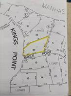 Kings Point Spectacular West Side Water Views. Unique Opportunity To Build Your Own Custom Built Dream Home On This Magnificent Kings Point Acre In One Of Those Most Sought After Locations In Kings Point. Survey Attached