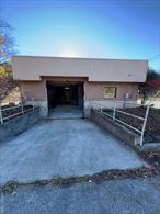 This historic and rare Campbell Hall Commercial building is said to have been built by The Borden Cheese Company back in the 1940&rsquo;s. It is an impressive space and well suited for distribution, warehouse, storage and so much more. Located in a very central location, you can be in the surrounding communities and to the major traffic corridors in minutes. This building offers high ceilings, an open floor plan, a private loading dock with great clearance and a power overhead door. There is an independent entrance that opens into a reception / office space. There are two additional and convenient rooms for either office or production space, in addition to the main floor space. There is an overhead hoist/lift that was previously used in the repair of fork lifts and other heavy duty Industrial equipment. Property class; Other Storage, Warehouse and Distribution Facilities (449) Zoning / Rural Preserve (R-4A)