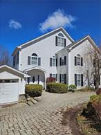 Interesting and unique totally renovated and refurbished home with central air. Square footage does not include partial finished walk out basement with full bath. ... Laminate flooring throughout with ceramic tile flooring in kitchen. Basement and bedroom carpets are newer. All stainless steel appliances are newer.. Newer quartz counter tops in kitchen. . Washer/dryer on the ground floor in the half bath closet off the kitchen. Trash pickup is private. Wood burning fireplace. Includes carriage house with plumbing. Deck in back of the home overlooking spacious side and rear yard.  Close to bus stop to NYC for commuting and convenient proximity to all the eclectic and convenient amenities that Warwick offers including wonderful shopping,  sumptuous pubs and restaurants, great delis, lovely parks, outdoor concerts, churches, schools, farmers markets, live performance theater, craft breweries, wineries, hiking/walking trails, skiing, kayaking and other lake activities. Tax amount does not reflect star exemption.