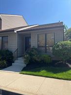 CHARMING GROUND FLOOR 2 BEDROOM, 2 BATH- CONDO IN GREAT CONDITION. FEATURES AN EAT-IN-KITCHEN W/ GRANITE COUNTERTOPS & STAINLESS STEEL APPLIANCES. SPACIOUS LIVING ROOM/DINING ROOM WITH SLIDERS TO BACK DECK. LAUNDRY ROOM IN HALLWAY, PRIMARY BEDROOM ENSUITE WITH FULL BATH & A WALK-IN CLOSET. SECOND LARGE BEDROOM WITH FLOOR TO CEILING CLOSET. WONDERFUL AMENITIES THAT COMPLEMENT THIS PRIMELY LOCATED DEVELOPMENT INCLUDES: CLUBHOUSE + GYM + POOL + TENNIS COURT AND PLENTY OF GUEST PARKING... VERY LOW MAINTENANCE LIVING!