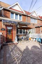 Welcome to 147-71 Hoover Avenue, Briarwood! Beautifully maintained 2-bedroom, 1.5-bath brick home featuring a bright open-concept living and dining area with hardwood floors and elegant finishes. The updated kitchen offers stainless-steel appliances, granite countertops, and a tile backsplash. Fully finished basement with heated floors, laundry area, and additional storage perfect for recreation or guest use. Enjoy a private, fully paved backyard with a covered patio ideal for outdoor entertaining. Split A/C units, updated windows, and great natural light throughout. Conveniently located near transportation, schools, shopping, and houses of worship. Move-in ready!