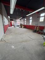 Opportunity to move your business to a large garage or warehouse with 13&rsquo; ceilings located in the heart of Ossining. Space has been approved for a laundromat. Behind the garage is a shared bath and approximately 200 sq. ft. of additional space if wanted for $200 per month. A private bath will be installed along with finished office. Hair salon rents unit attached and building adjacent is the Ossining Valley Bookstore. One street over (Main street) has many shops and restaurants.