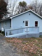 Charming ranch in the village of Unionville, located in the Minisink Valley schools. A spacious mudroom welcomes you into a gorgeous kitchen with quartz countertops and new stainless steel appliances. The primary bedroom features a modern half-bath. Enjoy a level yard perfect for summer BBQs or cozy fire pits on cool autumn nights. Accessible entry features. The full basement provides excellent storage. Only 15 minutes to High Point State Park for hiking or a relaxing beach day. Additional information: Heating fuel, oil, with an above-ground tank.