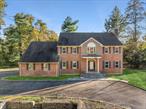Set on two exceptional acres at the end of a private cul-de-sac, this classic 5-bedroom, 4-bath Colonial offers timeless elegance, privacy, and a rare connection to Long Islandâ€™s storied estate era. A long, sweeping driveway leads to the residence, which sits elevated on the property, creating a stately first impression against its beautifully wooded surroundings.This home occupies the historic site of the Sir Ashley Sparks Estate, Northaw, once part of a 275-acre retreat tied to prominent international figures. Blending history and opportunity, it offers traditional comfort and tremendous potential for customization or expansion.Inside, approximately 4, 200 square feet of light-filled living space includes generous formal rooms, a welcoming kitchen and family area, and flexible bedroom and office options perfect for todayâ€™s living needs. Walls of windows and serene property views bring the beauty of the setting indoors. The unfinished space upstairs can be finished to create additional living area, offering endless possibilities to tailor the home to your lifestyle.The property also features a gunite pool, perfectly framed by its natural landscaping. A rare combination of history, privacy, and lifestyle, this residence is part of the exclusive Oyster Bay Estates enclave and located within the highly sought-after Syosset School District.A timeless home with a remarkable past, incredible potentialâ€”and an even brighter future.