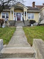 This beautifully updated Cape Codâ€“style single-family home offers 3 bedrooms and 2.5 baths, including a generous first-floor primary suite. The main level features a spacious living room with a fireplace, a formal dining room, and an elegant kitchen with granite and wood countertops along with stainless steel appliances. High ceilings, detailed moldings, a full bath, and a convenient laundry area complete the first floor.The second level includes two additional bedrooms and a half bath. The property also offers a full unfinished basement and a detached garage. Ideally situated within walking distance to a dog park, public park, downtown restaurants, and City Hall, with easy access to major highways and nearby hospitalsâ€”perfect for commuting and everyday convenience.