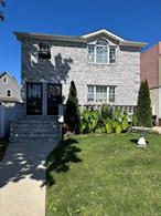 Built in 2018, this well-maintained two-family home offers modern comfort, income potential, and a highly convenient location in the heart of Jamaica. Each unit features three bedrooms, two full bathrooms, hardwood flooring, and a classic, functional layout with great natural light. Both units provide excellent flexibility for end-users, investors, or multi-generational living.A separate entrance leads to the basement, offering additional versatility for storage or future use (per local regulations). The property also includes a front porch, a two-car garage, and a private driveway, giving you rare off-street parking and easy access.Conveniently located near major public transportation options, including the E, J, and Z trains, multiple bus lines, and the AirTrain to JFK. Enjoy close proximity to local shopping, dining, parks, and many of the cultural and recreational activities Queens is known for.Current tenants are month-to-month, and the property can be delivered vacant.A strong opportunity for owner-occupants or investors seeking a young, low-maintenance home in a central Queens location.