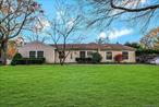 A Stunning, Sprawling 2100 Square Foot All On One Level Expanded Ranch, Oversized Perfectly Flat .43 Acre Property On A Beautiful Wide Level Neighborhood Street Close To Shopping, Major Roadways, Long Island Sound Beaches, The Amazing New North Shore Greenway Walk & Bike Trail, And The Highly Sought After Miller Place School District - Absolutely The Home That You Have Been Waiting For! Beautiful Curb Appeal - Three Massive Rock Oak Trees Shade The Meticulously Landscaped Property Wrapped In Leland Cypress, Arborvitae, Burning Bushes, Butterfly Bushes & Lilacs, Two Driveways Leading To The Brick Walkway & Steps, And Into The Home Offering A Modern Open, Yet Warm & Inviting Floorplan - A Porcelain Tiled Entry Opens Into The Elegant Living Room Offering Warm Comfortable Decor, Laminate Flooring, A Double Window For Natural Light, Ample Room For Furniture, And The Living Room & Hallway Open Into The Kitchen & Dining Room. The Stunning, Open Concept Kitchen & Formal Dining Room Offers An Expansive Open Space Perfect For Entertaining Family & Friends, And Holiday Get Togethers...The Kitchen Offers Custom Cherry Finished Cabinetry With Beautiful Crown Moldings, Stone/Granite Countertops, Tumbled Marble Tiled Backsplash, Large Full Extension Pot Drawers, Lazy Susan, GE Stainless Steel Ceramic Top Double Oven With Convection, Built In Microwave Oven, Whirlpool French Door Refrigerator With Bottom Freezer, Whirlpool Dishwasher, Large Pantry Closet, Porcelain Tile Floors & Ample Room For A Good Sized Table & Chairs. A Wonderful Cast Iron Wood Burning Stove With Brick Platform & Background Wall Sits In Between The Kitchen & The Dining Room, And The 21&rsquo;1 x 11&rsquo;4 Formal Dining Room Offers A Charming Wall Of Built In Bookshelves, Porcelain Tile Floors, Ample Room For A Large Dining Room Set, And French Doors Into The Great Room. The Spectacular 34&rsquo;7 x 13&rsquo;5 Great Room Offers Expansive Entertaining & Family Spaces, A Stunning Focal Point Wall Of Windows With A Large Circle Topped Window, Beautiful Custom Moldings & Crown Moldings, Illuminating The Room With Natural Light, Gleaming Hardwood Floors, Recessed Lighting & Access To The Backyard. The Well Sized Primary Bedroom Offers Two Large Windows For Natural Light, Two Double Sized Closets, Ceiling Fan, Crown Moldings & Ample Room For Furniture, The First Guest Bedroom Is Well Sized With A Large Window For Natural Light, Laminate Floors, Ceiling Fan, Crown Moldings, Large Closet & Ample Room For Furniture, The Second, Larger Guest Bedroom Offers Two Large Windows For Natural Light, Laminate Floors, Ceiling Fan, Crown Moldings, Good Sized Closet & Ample Room For Furniture, And The Beautifully Upgraded Full Bathroom Offers Soaring Tongue & Groove Cedar Ceilings, Halfway Ceramic Tiled Walls With Decorative Borders, Bombe Front Marble Topped Vanity, Full Bathtub/Shower With Custom Walls/Surround, Ceramic Tile Floors & Upgraded Fixtures. Off Of The Dining Room Is The Very Large 4th Bedroom/Office (This Was Part Of The Garage & Could Easily Be Converted Back) Offering Soaring Ceilings With A Skylight, Tongue & Groove Pine Walls And Ample Room For A Large Bedroom Set Or Home Office, And A Lovely Half Bath/Laundry Room (Easily Converted Into A Full Bathroom) Offering A Modern Gray Vanity, Upgraded Fixtures & Full Sized GE Washer & Dryer. The Half Garage Offers A Workshop, Lots Of Storage Space & Access To The Attic (Lots Of Storage) & The Entertainer&rsquo;s Very Private Fully Fenced Large Backyard (PVC Front & Sides And Wood In The Back) Offers All Custom Stone Walls & Stairways, A Beautiful Custom Herringbone Style Large Paver Patio With Accent Bamboo Wall, Beautiful Open Lawns & Entertaining Spaces, Privacy Hedges, A Large 10&rsquo; x 14&rsquo; Storage Shed With Electric & Double Side Gates On Maple Avenue (Perfect For A Boat, RV Or Trailer). Hurry To See This One Of A Kind Stunning, Sprawling Expanded Ranch On Beautiful Oversized .43 Acre Property In The Top Rated Miller Place School District Before It&rsquo;s Gone!