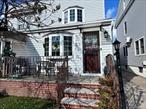 Bright and Sunny updated one family colonial house in Bayside. It offers an open concept first floor with a living room, dining room, full bathroom, eat in kitchen with marble counters and island counter top and door with access to the backyard. Upstairs offers 3 bedrooms with ductless A/C and a fully updated bathroom. The fully finished basement with boiler room, laundry( LG washer and dryer) and family room. Outside the property features Garage and Tesla home charger. Hardwood floors throughout, Ductless A/C, New Windows, New Roof, New Siding and New Gutter redone in 2020. New Kitchen and Bathrooms remodeled in 2025. Electricity raised to 200 amps. Gas Heat. Walk to LIRR station. Low property taxes. Zoned R4--1.School Districts 26. Move In Condition. Must see it !!!
