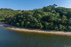 Spectacular waterfront property. Three subdivided lots in the most desirable location in Lloyd Harbor. This is a once in a lifetime opportunity to build your dream home on land fronting beautiful Cold Spring Harbor. This 7+ acre waterfront property sits at the end of a private road with its own approximately 1/4 mile of private sandy beach. Lots are not being sold individually. Enjoy unparalleled beauty, serenity and incredible western sunsets.Do not drive down private road. Private driveway. Private road association. Dues required.