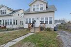 Legal two-family in Patchogue Village. Two-bedroom 1-bath apartment on the main floor and one-bedroom 1-bath apartment upstairs.